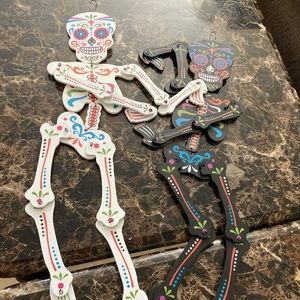 Pair of Skeleton Wall Hanging By Rite Aid in Black & White